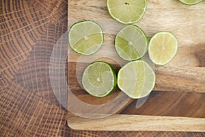 Slicing these vibrant limes in half, ready to add a burst of tangy flavor to my dishes