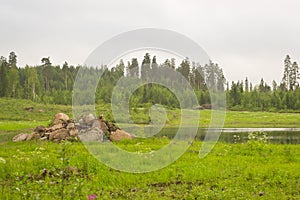 Slide granite stones on shore of lake, Hamina, Finland, Suomi