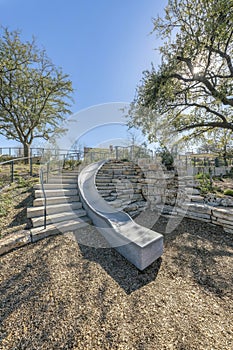 Slide and outdoor staiway on a sunny day at Waterloo park in Austin Texas