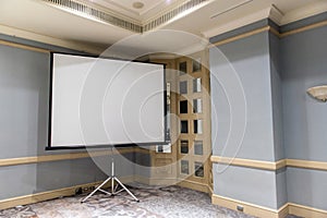 Slide projector white screen in the meeting room