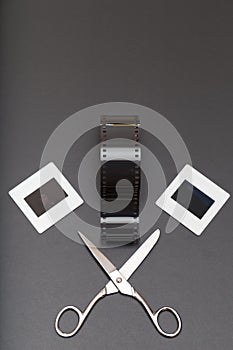 Slide , reversal film and scissors with copy space photo