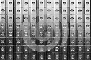 Slide nuts in a row, abstract industrial background photo