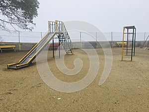 Slide and stairs play ground students.
