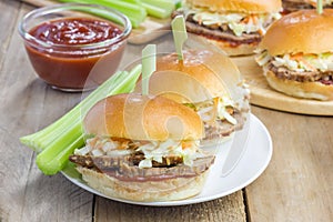 Sliders with beef brisket, barbecue sauce and coleslaw