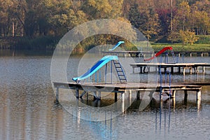 Slides on the lake dock