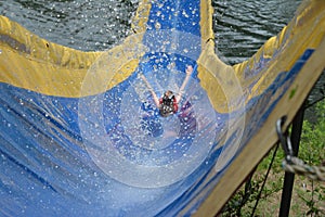 Sliding Down Camp Waterslide