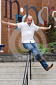 Sliding Down a Railing photo