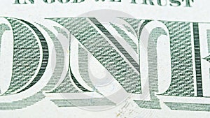 Sliding video of a one US dollar bill note, showing `ONE` text and image of the pyramid and the eagle.