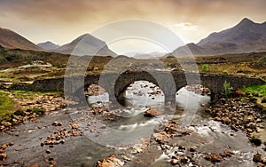 Sligachan Old Bridge with beautiful view on Black Cuillin mountains, in Isle of Skye, Scotland, UK