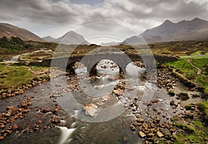 Sligachan Old Bridge with beautiful view on Black Cuillin mountains, in Isle of Skye, Scotland, UK