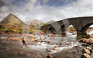 Sligachan Old Bridge with beautiful view on Black Cuillin mountains, in Isle of Skye, Scotland, UK