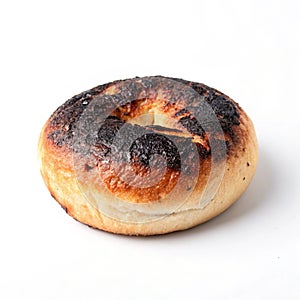 Burnt bread roll isolated on white background