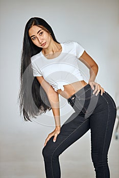 Slim attractive woman isolated over white background