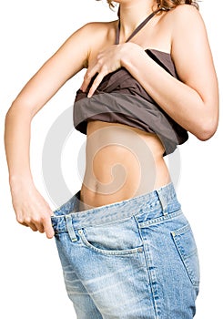 Slim girl in big size jeans