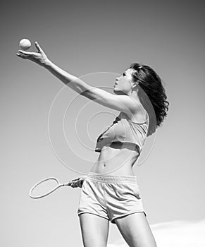 slim girl with fit belly. healthy lifestyle. dieting. freedom. playing big tennis. sport and fitness. sporty woman