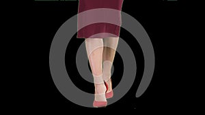 Slim legs of woman wearing high heel shoes walking, Alpha Channel