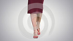 Slim legs of woman wearing high heel shoes walking, Alpha Channel