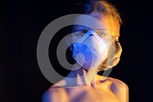 Slim sensitive woman in mask with naked shoulders.