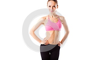 Slim waist of young sporty woman, detail of perfect fit female body isolated