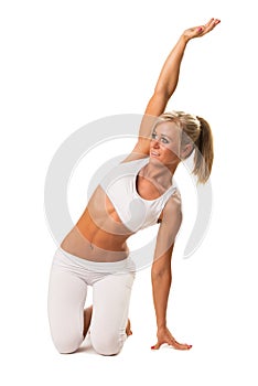 Slim woman doing stretching exercise