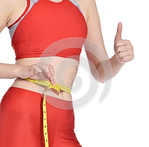 Slim woman waist measuring