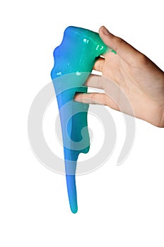 Slime elastic and viscous on child`s hand photo