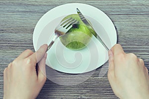 Slimming dieting weight loss woman starving concept. Concept of healthy eating. Close up top above overhead photo of woman`s hand