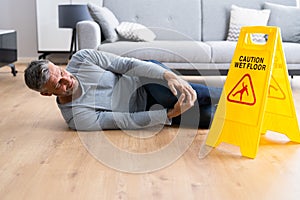 Slip Fall Accident. Floor Sign Caution