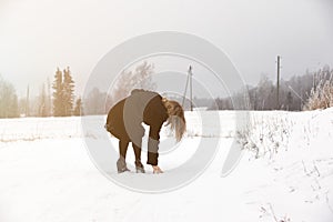 Slip on the slippery ice and snow on the road track at the country in freezing winter day