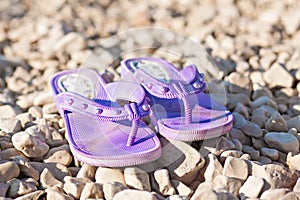 Slippers and bag at sunny beach and summer season