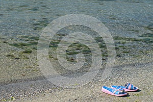 Slippers on the beach