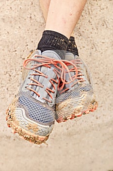 Slippers filled with mud after a Spartan race