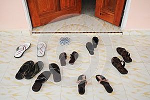 Slippers infront of door