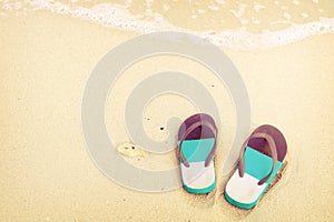 slippers on tropical beach in summe