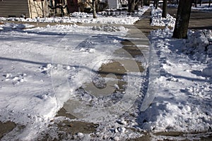 Slippery, Icy Sidewalk in the City photo