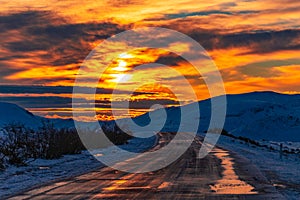 Slippery road in mountainous area at dawn time