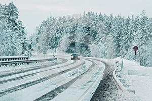 Slippery snowy Northern winter road, turn on the road. Kola Peninsula