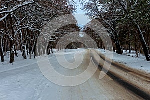 Slippery snowy road in winter