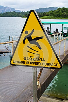 Slippery surface warning label