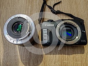 Sliven/Bulgaria - 4/26/2020:Black Canon EOS M. The First mirrorless camera of Canon.It has a solid build, with a magnesium alloy b