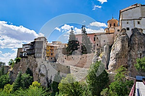 Slope of Canonigos street towards the hanging houses of Cuenca, Spain