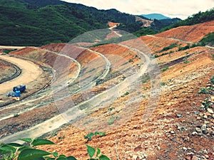 Slope cutting with berm drains