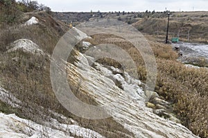 A slope of a non-working side of a clay pit