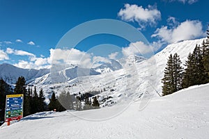 Slope with a sign in ski resort Serfaus Fiss Ladis in Austria wi