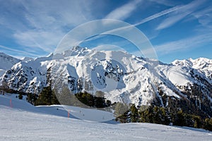 Slope in ski resort Serfaus Fiss Ladis in Austria with snowy mountains