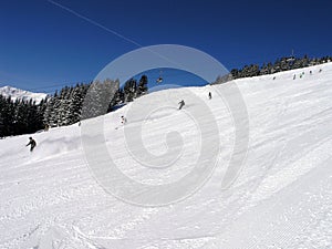 Slope with skiers