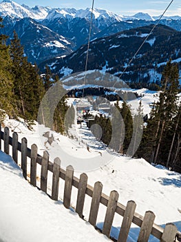 Slope view with funicular in winter in resort Ladis, Fiss, Serfaus in ski resort in Tyrol