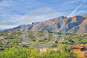 Sloped shrubland mountainside houses at Tucson, Arizona