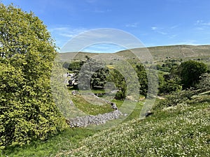 Sloping fields, and distant hills near, Chapel-le-Dale, Yorkshire, UK