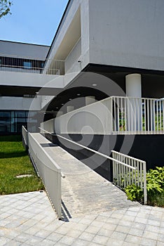 Sloping footpath of newly built modern building